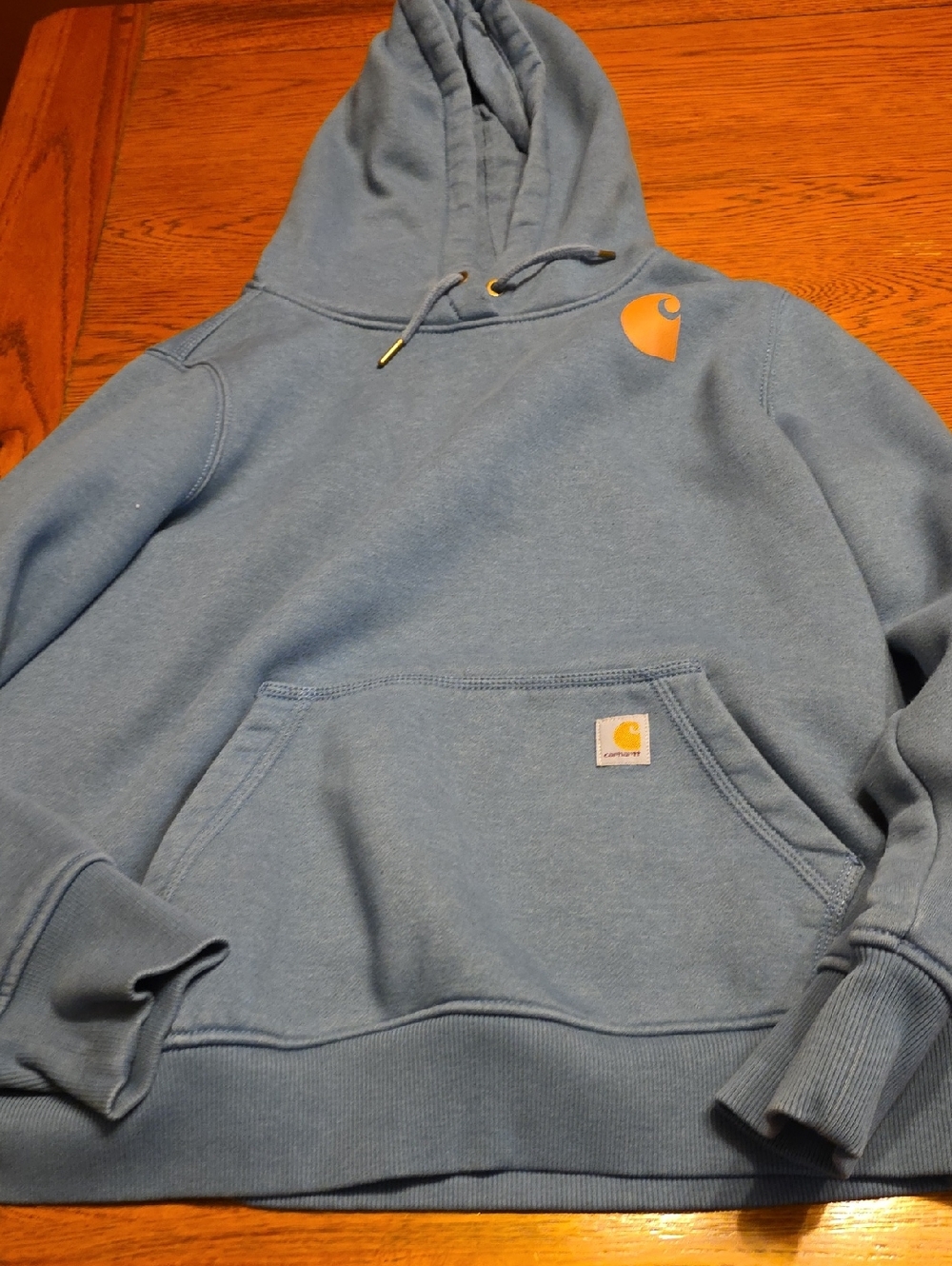 Carhartt Light Blue Hooded Sweatshirt with Orange Logo